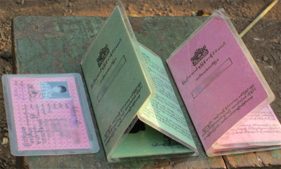 Full ID card left next to Kokang 3-folding ID cards